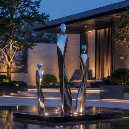 Modern landmark sculpture displayed in an architectural outdoor space with water features and contemporary design