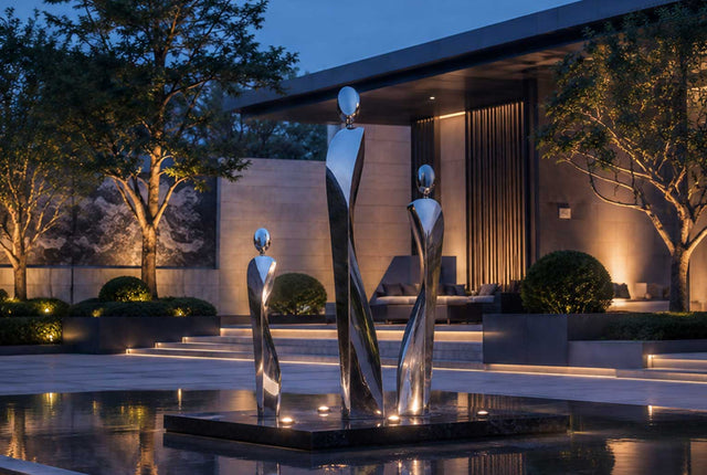 Modern landmark sculpture displayed in an architectural outdoor space with water features and contemporary design