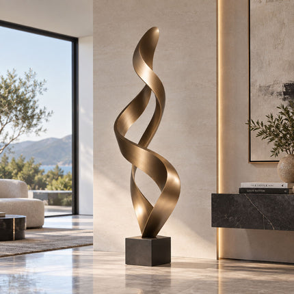 Abstract bronze ribbon sculpture with overlapping curves in a modern residential interior