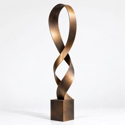 Abstract bronze ribbon sculpture with a continuous twisting form, elongated open loop, and square bronze base on a white background
