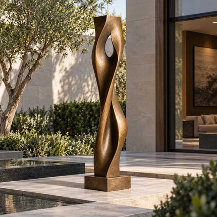 Abstract bronze sculpture displayed beside a reflecting pool in a contemporary courtyard
