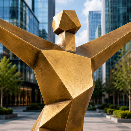 Detail view of handcrafted geometric figure sculpture showing angular stainless steel construction