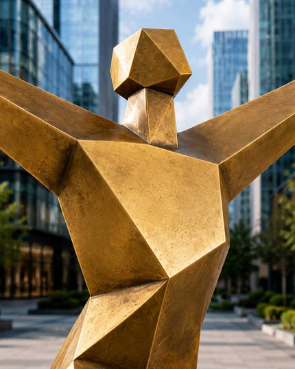 Detail view of handcrafted geometric figure sculpture showing angular stainless steel construction