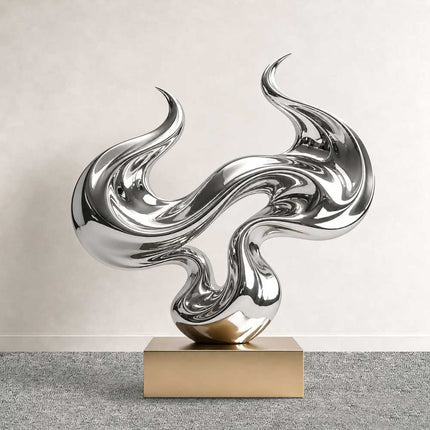 Abstract flow sculpture in mirror polished stainless steel with fluid reflective curves