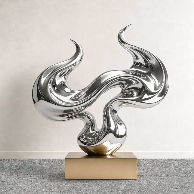 Abstract flow sculpture in mirror polished stainless steel with fluid reflective curves