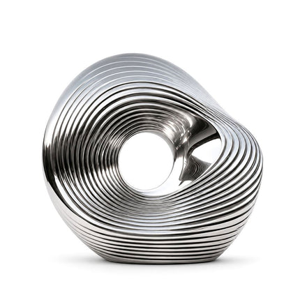 Abstract modern stainless steel sculpture with reflective polished surface