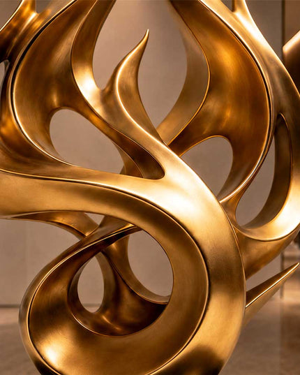 Detail of handcrafted curved stainless steel abstract sculpture form