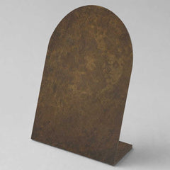 Aged bronze finish inspired by naturally weathered bronze with subtle tonal variation.