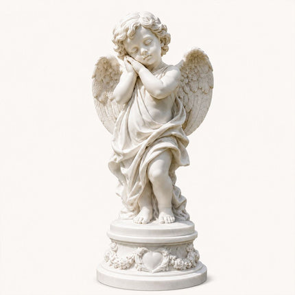 Marble angel statue with a peaceful resting pose and detailed wings