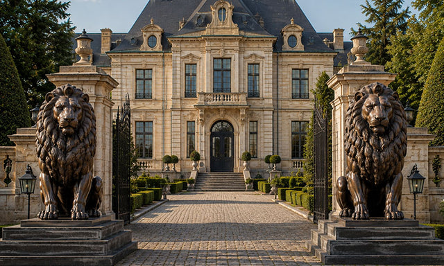 Lion animal sculptures displayed at the entrance of a luxury estate