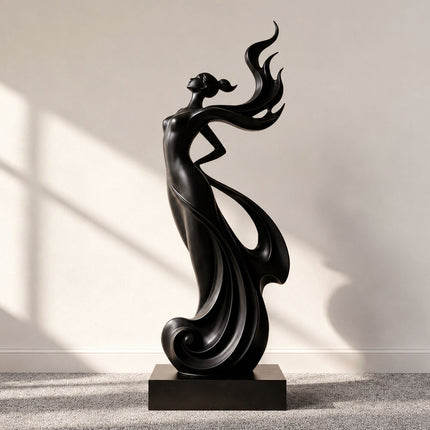 Black abstract figure sculpture crafted from stainless steel with flowing sculptural curves
