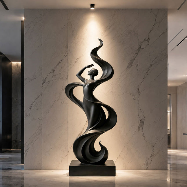 Black stainless steel female figure sculpture displayed in a luxury marble interior