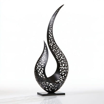 Black abstract stainless steel sculpture with perforated organic curves and central negative space