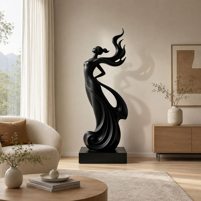 Black stainless steel abstract figure sculpture displayed in a contemporary luxury interior