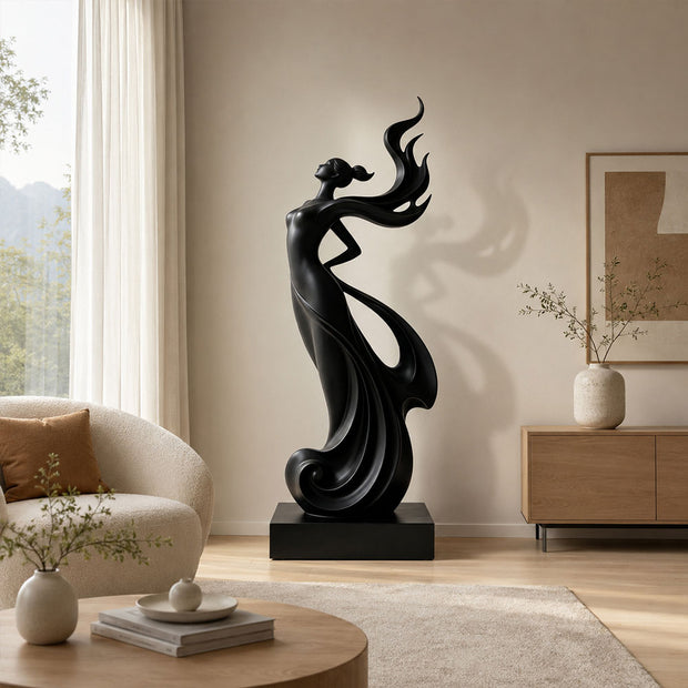 Black stainless steel abstract figure sculpture displayed in a contemporary luxury interior