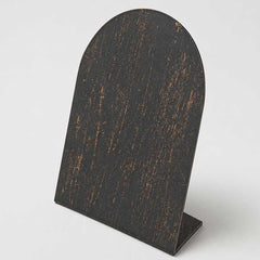 Blackened bronze finish with subtle golden brushed highlights over a dark bronze base.