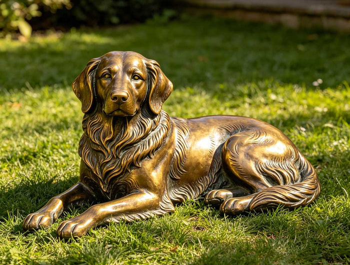 Bronze dog sculpture displayed in a residential garden landscape