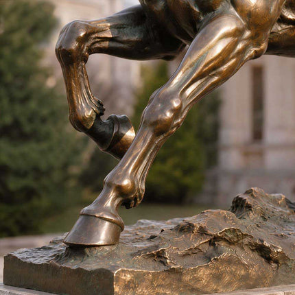 Close-up detail of handcrafted bronze horse sculpture surface