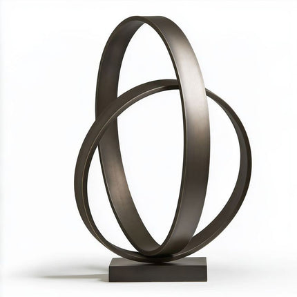 Bronze sculpture with two interlocking open ring forms