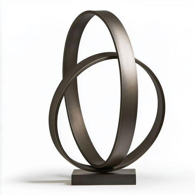 Bronze sculpture with two interlocking open ring forms