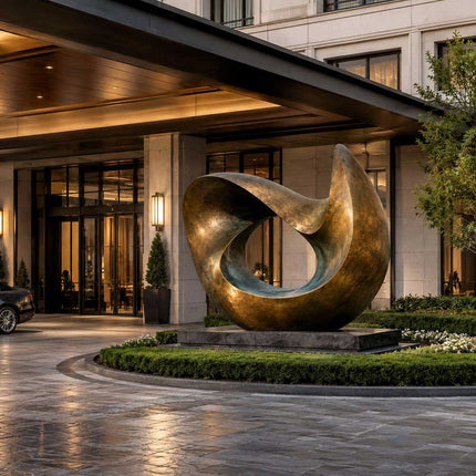 Bronze sculpture displayed in a luxury architectural environment