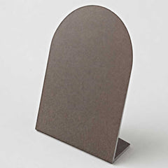 Burnished bronze finish with a deep warm grey-brown tone and softly aged metallic character.