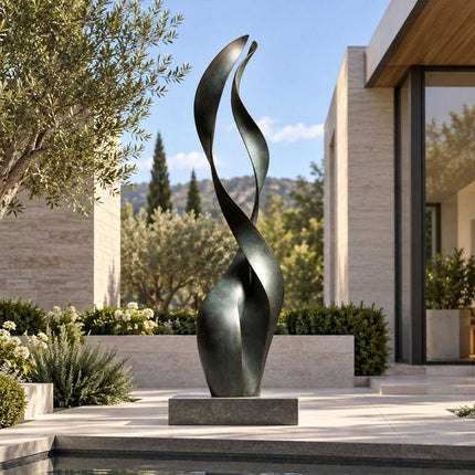 Contemporary bronze sculpture with intertwined curved forms displayed beside a reflecting pool