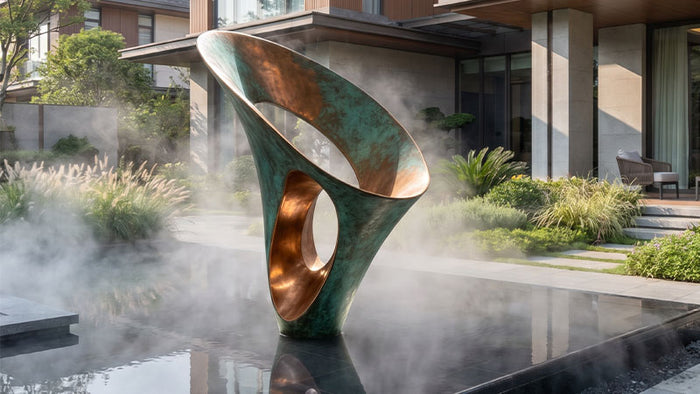 Contemporary garden sculpture displayed in a luxury residential landscape with water features and modern architecture.