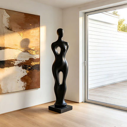 Contemporary human form stainless steel sculpture featuring an elegant abstract silhouette