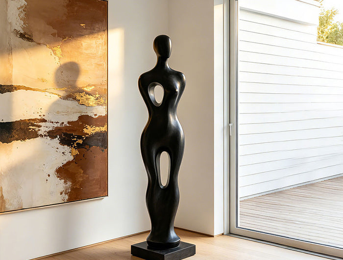 Contemporary human form stainless steel sculpture featuring an elegant abstract silhouette