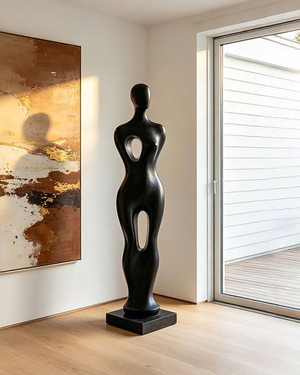 Contemporary human form stainless steel sculpture featuring an elegant abstract silhouette