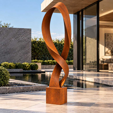 Corten steel sculpture with a tall open loop displayed in a modern residential courtyard