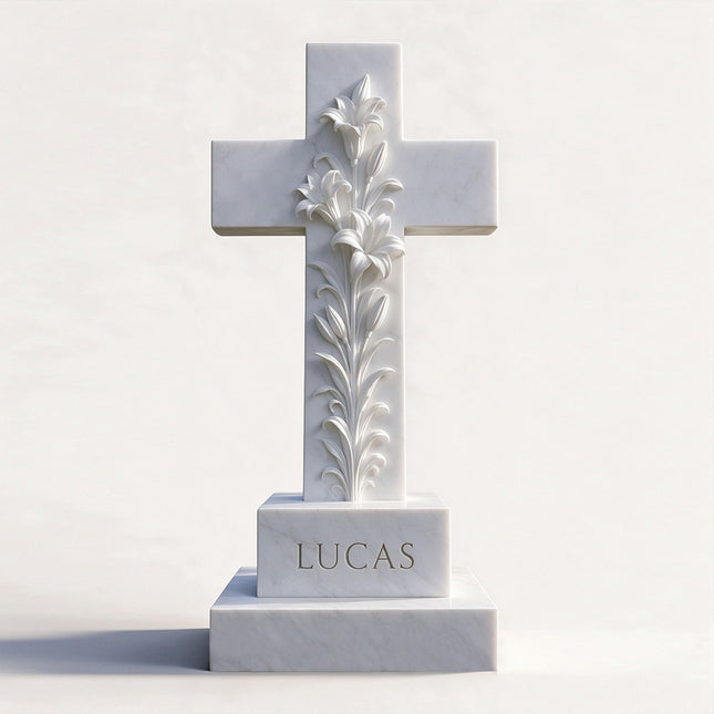 White cross headstone with carved lilies, an inscription block, and a stepped base