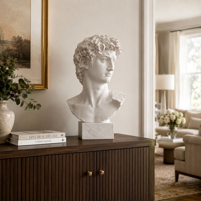 Marble David bust sculpture displayed in an elegant interior space
