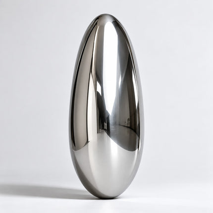 Mirror polished stainless steel sculpture with a smooth elongated oval form