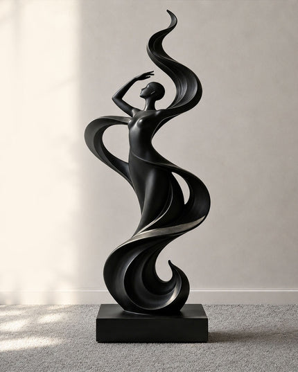 Flowing female figure sculpture in black stainless steel with an elegant curved silhouette