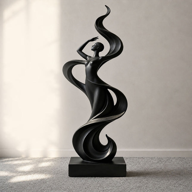 Flowing female figure sculpture in black stainless steel with an elegant curved silhouette