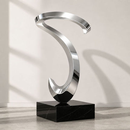 Flowing loop abstract sculpture in mirror polished stainless steel with stone base