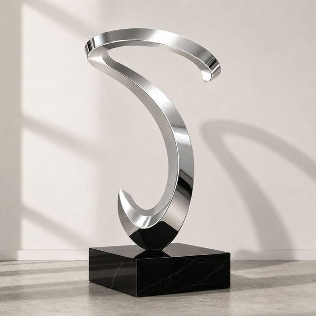 Flowing loop abstract sculpture in mirror polished stainless steel with stone base
