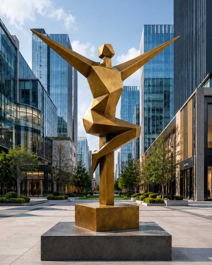 Geometric stainless steel figure sculpture installed in a contemporary urban landscape