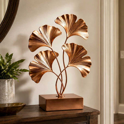Ginkgo inspired stainless steel sculpture displayed as a refined interior accent