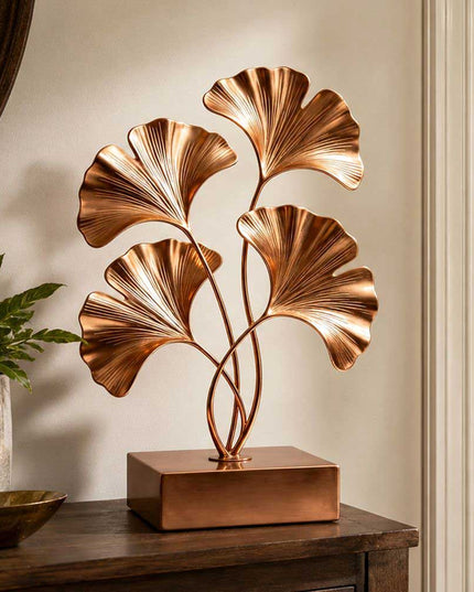 Ginkgo inspired stainless steel sculpture displayed as a refined interior accent