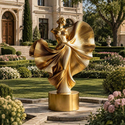 Large gold figurative sculpture placed within an elegant estate landscape environment