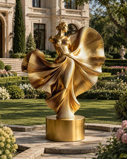 Large gold figurative sculpture placed within an elegant estate landscape environment