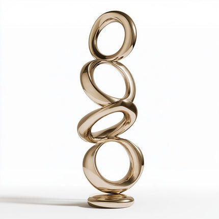 Gold mirror abstract circular sculpture with overlapping stainless steel rings