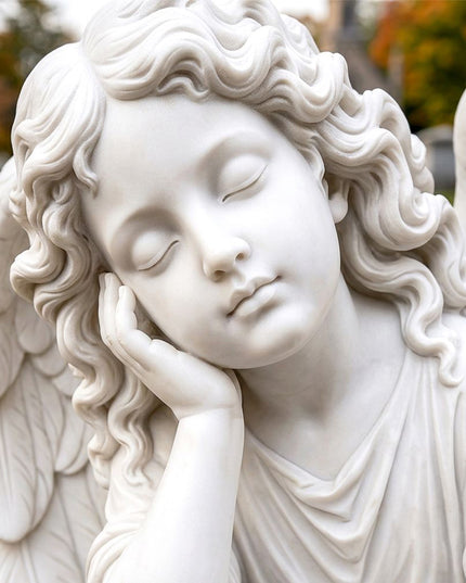 Close-up view of handcrafted marble religious angel statue details
