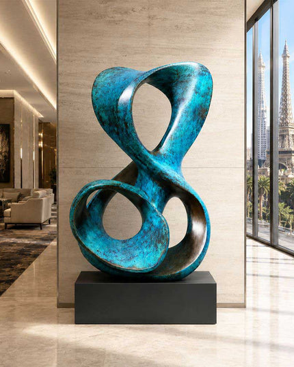 Patinated bronze abstract sculpture displayed in a contemporary luxury interior space