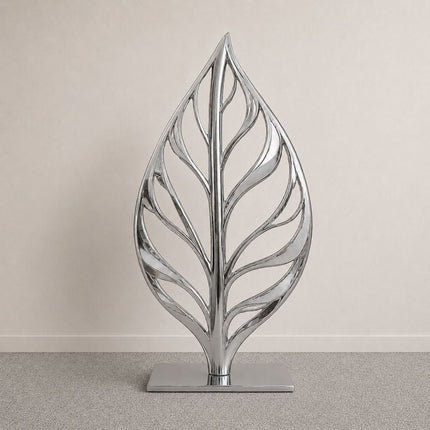 Leaf inspired organic sculpture crafted in mirror polished stainless steel