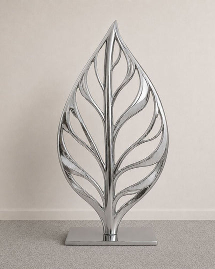 Leaf inspired organic sculpture crafted in mirror polished stainless steel