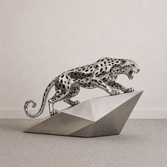 Modern stainless steel leopard animal sculpture with dynamic pose and polished surface
